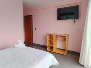 Postel nebo postele na pokoji v ubytování Hotel Sunlight