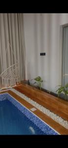 The swimming pool at or close to rawaa chalet