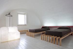 Predel za sedenje v nastanitvi Basiliani Hotel