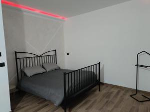 Letto o letti in una camera di Casa Antonelli