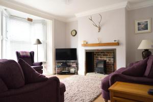 Μια τηλεόραση ή/και κέντρο ψυχαγωγίας στο Elgin cottage