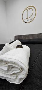 Кровать или кровати в номере Da Tonino luxury apartments