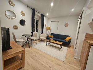 Χώρος καθιστικού στο Le Petit Cocon de Saint-Brieuc