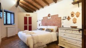 Postel nebo postele na pokoji v ubytování Il palmento dell'Etna