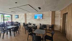 TV a/nebo společenská místnost v ubytování Xoza Hotel Urban Escape