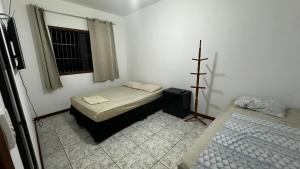 Cama ou camas em um quarto em Regi House Hostel