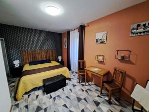Postel nebo postele na pokoji v ubytování hôtel le Béarn
