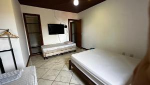 Cama ou camas em um quarto em Regi House Hostel