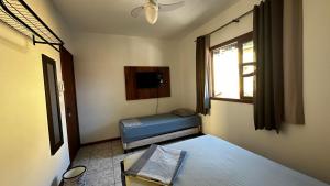 Cama ou camas em um quarto em Regi House Hostel