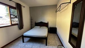 Cama ou camas em um quarto em Regi House Hostel