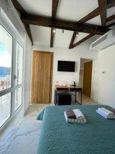 Postel nebo postele na pokoji v ubytování Ancora Hotel