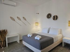 Postel nebo postele na pokoji v ubytování Galazio Rooms & Suites