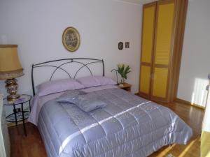Postel nebo postele na pokoji v ubytování B&B Isonzo