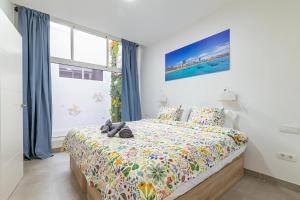 Postel nebo postele na pokoji v ubytování Garden House - La Isleta