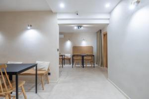 a dining room with a table and chairs at lo͝or luxury retreat in Split