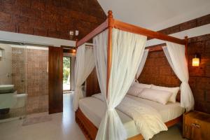 Postel nebo postele na pokoji v ubytování Misty Forest Resort Wayanad