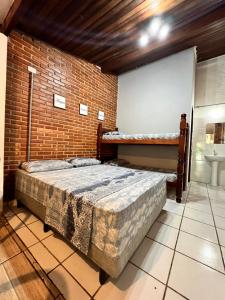 Postel nebo postele na pokoji v ubytování Flat Trindade