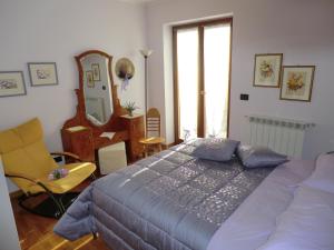 Postel nebo postele na pokoji v ubytování B&B Isonzo