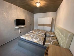 Postel nebo postele na pokoji v ubytování Apartmán Orlické hory