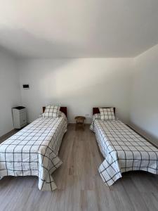 Giường trong phòng chung tại Senderos del Mar II