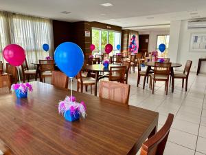 Restoran atau tempat lain untuk makan di Apartamento Família em bairro nobre de Cuiabá! +44 gambar
