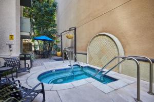 a small swimming pool in the middle of a building at Beverly Hills Gem 1 BR Apt with Parking 218 in Los Angeles