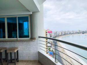 Un balcon sau o terasă la Departamento frente al mar