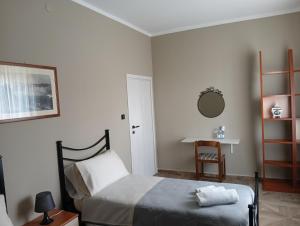 Postel nebo postele na pokoji v ubytování B&B da Giusy