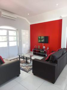 Posezení v ubytování Caribbeans Estates Villa 45 Calypso Drive