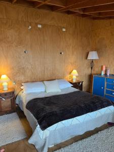 Ένα ή περισσότερα κρεβάτια σε δωμάτιο στο Alta Vista Llanquihue