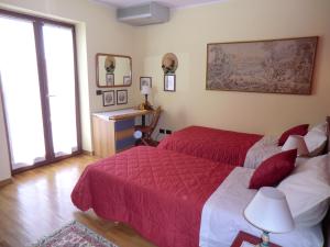 Postel nebo postele na pokoji v ubytování B&B Isonzo