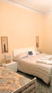 Postel nebo postele na pokoji v ubytování B&B BORGHI + 37 fotografií