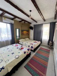 Postel nebo postele na pokoji v ubytování Jerusalén Hotel Boutique