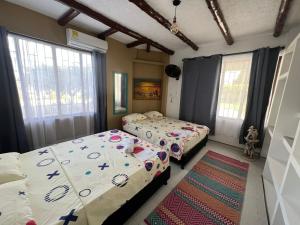 Postel nebo postele na pokoji v ubytování Jerusalén Hotel Boutique + 37 fotografií
