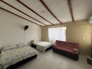 Postel nebo postele na pokoji v ubytování Jerusalén Hotel Boutique