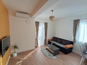 TV a/nebo společenská místnost v ubytování Gold Apartman