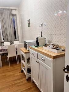 Η κουζίνα ή μικρή κουζίνα στο A casa di Sally +4 φωτογραφίες
