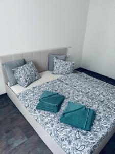 Postel nebo postele na pokoji v ubytování Pearl Bee Deluxe Suites