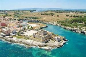 an aerial view of an island in a body of water at La Casa Di Piero e Mary in Brucoli