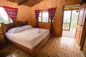 Postel nebo postele na pokoji v ubytování Primavera Ecoalbergue