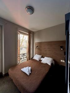 Postel nebo postele na pokoji v ubytování Grand Hôtel De L'Europe