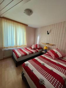 Postel nebo postele na pokoji v ubytování Hotel Rhoneblick