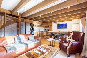 Posezení v ubytování Le lido des neiges - splendid luxury chalet 4 bedrooms 4 bathrooms