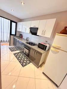 Η κουζίνα ή μικρή κουζίνα στο N15 Abir2 lumineux Parfait FAMILY +7 φωτογραφίες
