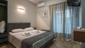Posteľ alebo postele v izbe v ubytovaní Anesi Rooms To Rent