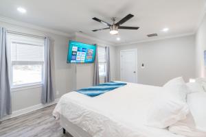 Ένα ή περισσότερα κρεβάτια σε δωμάτιο στο Winston Sleeps 16 - 2 Kitchens