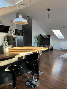 Kuchyň nebo kuchyňský kout v ubytování Moderne & stilvolle Wohnung klimatisiert - Messe & Flughafen München