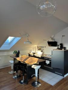 Kuchyň nebo kuchyňský kout v ubytování Moderne & stilvolle Wohnung klimatisiert - Messe & Flughafen München