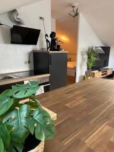 Kuchyň nebo kuchyňský kout v ubytování Moderne & stilvolle Wohnung klimatisiert - Messe & Flughafen München