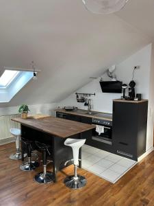 Kuchyň nebo kuchyňský kout v ubytování Moderne & stilvolle Wohnung klimatisiert - Messe & Flughafen München